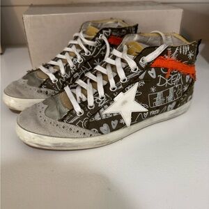 Golden Goose Mid Star Sneakers with Orange and Brown Accents